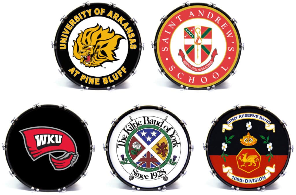 Five custom marching bass drum heads from universities, high schools, pipe bands, military bands