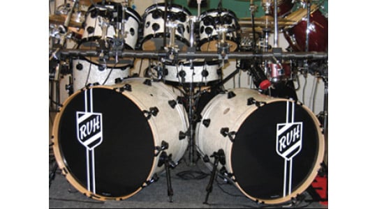 Double bass drum set with vintage logos drum heads